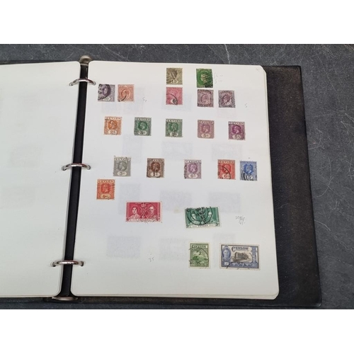 632 - STAMPS: miscellaneous collection housed in 12 albums, one tin and loose. (Box)