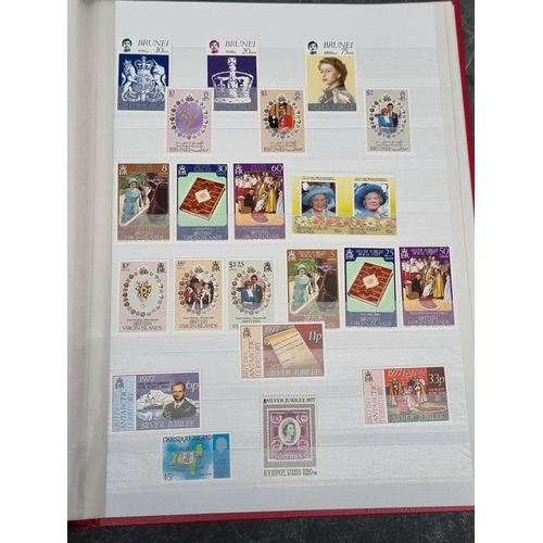 646 - STAMPS: collection in 3 albums, to include 2 albums of QEII commemoratives, mint and in sheets,... 