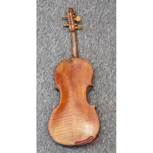 1494 - An antique Continental violin, labelled 'Antonius Stradivarius,... Anno 1735', with 14in two-pi... 