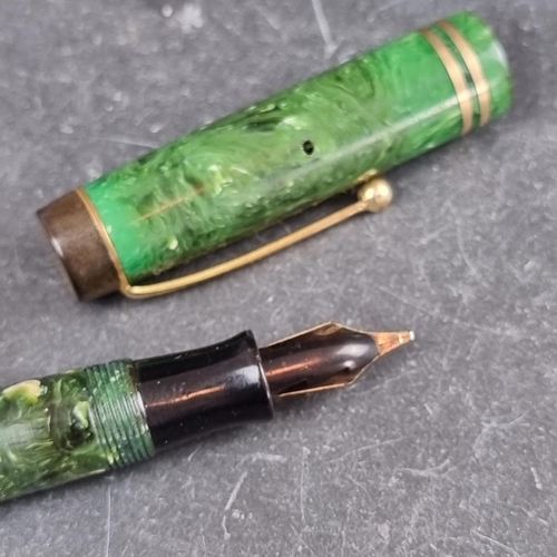 179 - A circa 1929-33 Parker streamlined 'Duofold' jade green fountain pen, 14K gold nib, 'Made in Canada'... 
