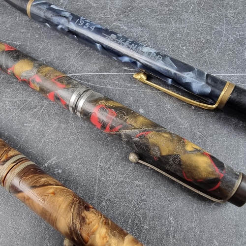 22 - Three vintage Conway Stewart propelling pencils, comprising: a 'Nippy' marbled blue example, (inscri... 