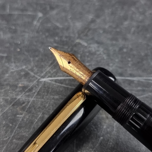 26 - A Montblanc Meisterstuck fountain pen, with 14K gold nib