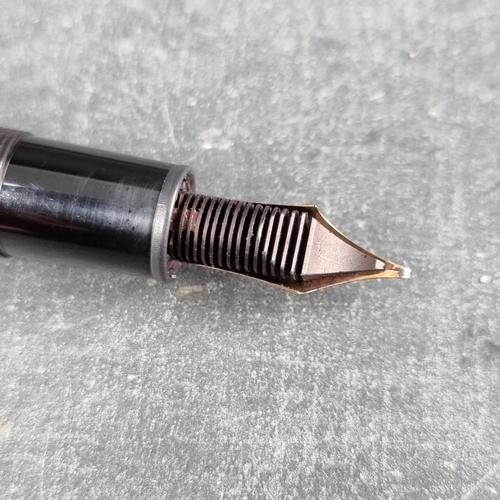 26 - A Montblanc Meisterstuck fountain pen, with 14K gold nib