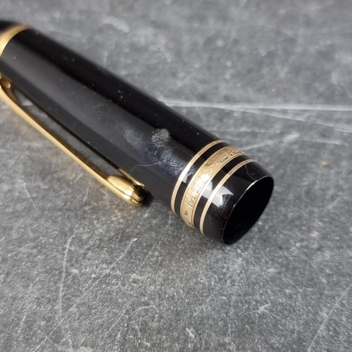 26 - A Montblanc Meisterstuck fountain pen, with 14K gold nib