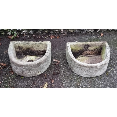 1691 - A pair of sandstone bowfronted troughs, 55 x 45.5cm.