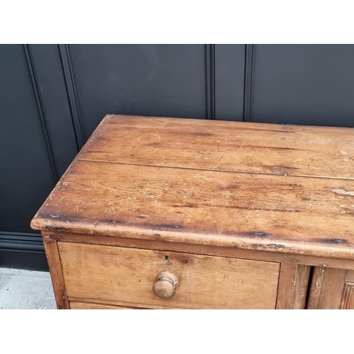 1002 - A Victorian pine dresser base, 182cm wide.