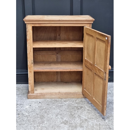 1003 - A Victorian pine panelled cabinet, 92cm high x 75.5cm wide.