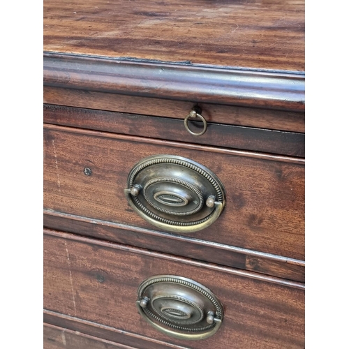 1007 - An 18th century mahogany chest of drawers, with brushing slide, 94cm wide, (faults and repairs)... 