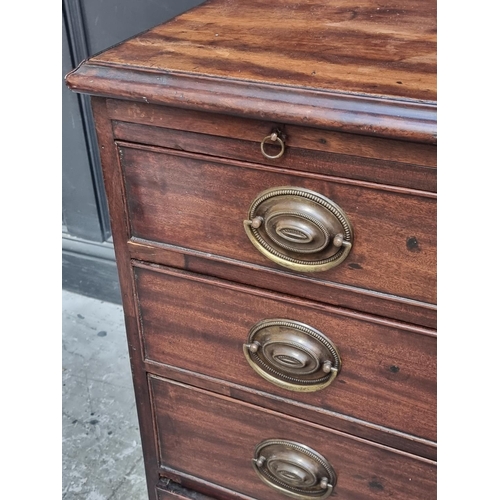 1007 - An 18th century mahogany chest of drawers, with brushing slide, 94cm wide, (faults and repairs)... 