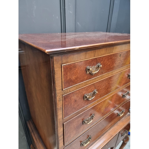 1009 - An 18th century style burr walnut chest on stand, 86cm at widest point.