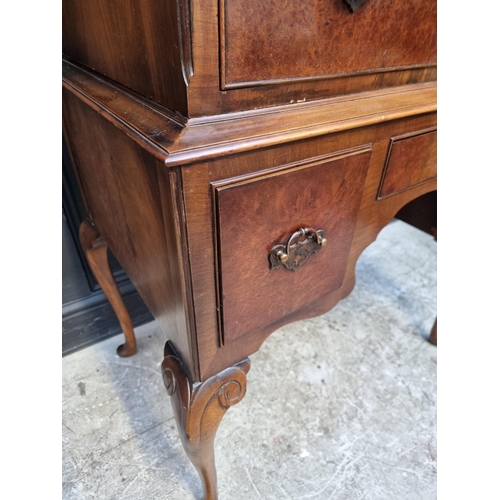 1009 - An 18th century style burr walnut chest on stand, 86cm at widest point.