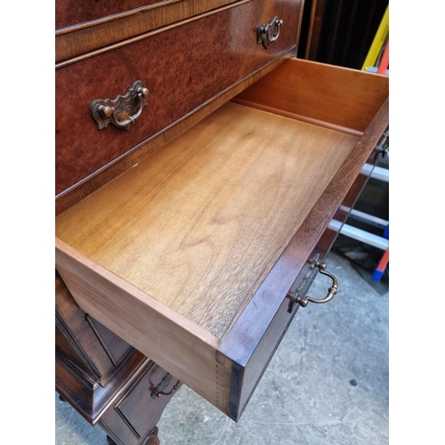 1009 - An 18th century style burr walnut chest on stand, 86cm at widest point.