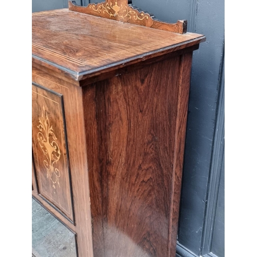 1014 - A late 19th century rosewood and inlaid side cabinet, 58cm wide.