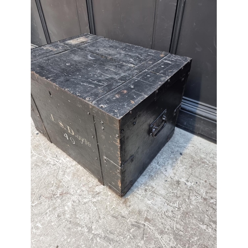 1015 - A Victorian ebonised and metal bound trunk, inscribed 'J.S. Doyle', 69cm wide.