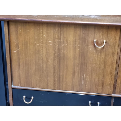 1018 - A mid-century G-Plan 'Librenza' dining suite, comprising: a drop leaf table, 137.5cm; a sideboard, 1... 