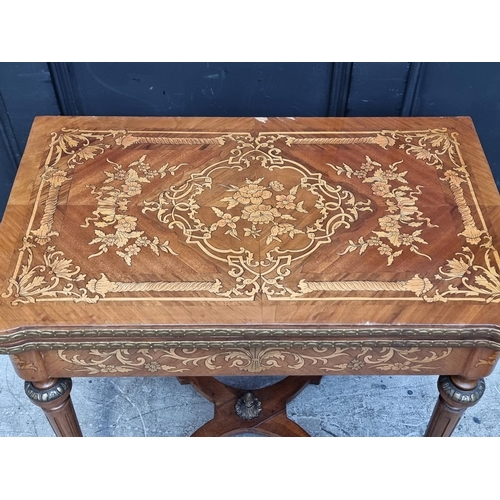 1023 - A Continental marquetry card table, 73cm wide.