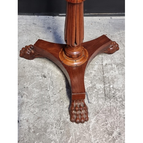 1024 - A 19th century carved mahogany adjustable music stand.