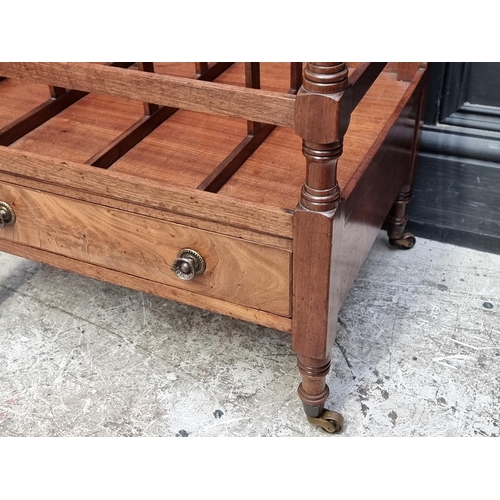 1028 - A 19th century mahogany Canterbury, 51cm wide.