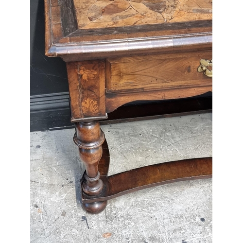 1029 - An 18th century Dutch walnut and inlaid dresser base, 153.5cm wide.