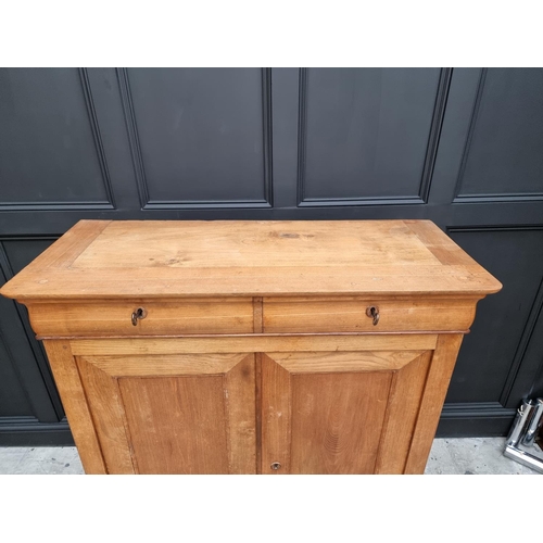 1039 - A 19th century French pale ash side cabinet, 132.5cm high x 113.5cm wide.