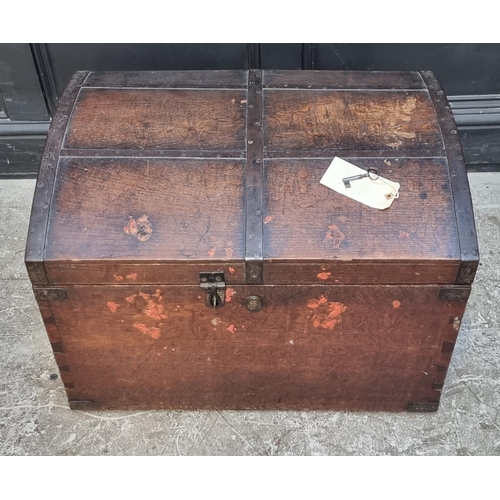 1041 - A Victorian oak and metal bound dome top chest, 70cm wide.