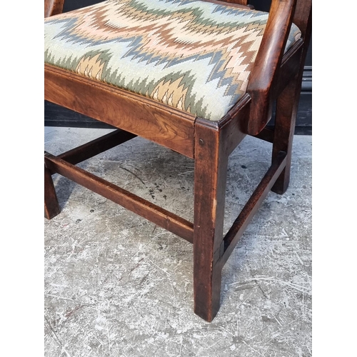 1050 - A George III elm elbow dining chair, with an unusual vase splat; together with another mahogany exam... 