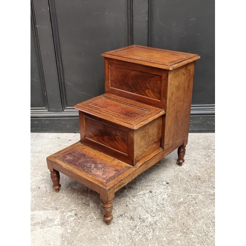 1066 - A set of Victorian mahogany library steps, with leather treads.