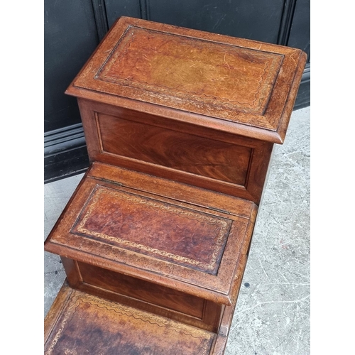 1066 - A set of Victorian mahogany library steps, with leather treads.