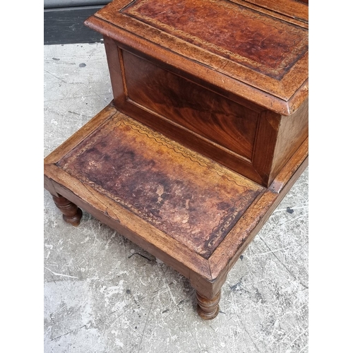 1066 - A set of Victorian mahogany library steps, with leather treads.