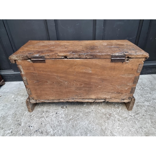 1071 - An interesting Continental 16th century carved oak and elm coffer, probably Flemish, 108.5cm wide.... 