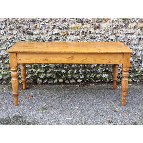 1072 - A Victorian pine kitchen table, with a lateral frieze drawer, 168.5cm long.