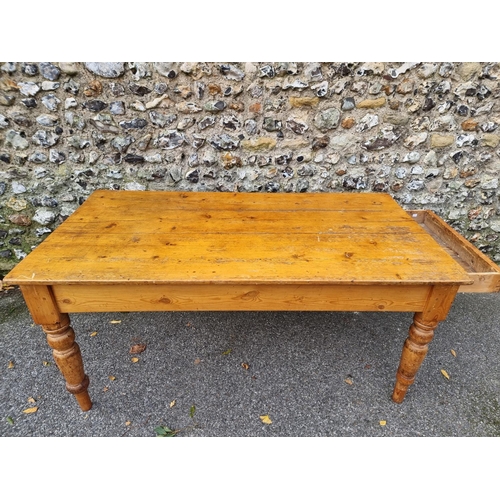 1072 - A Victorian pine kitchen table, with a lateral frieze drawer, 168.5cm long.