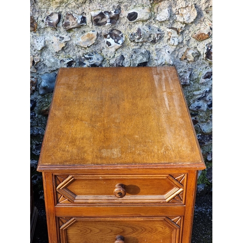 1073 - A pair of oak chests of drawers, (formerly part of a larger item), 44.5cm wide.... 