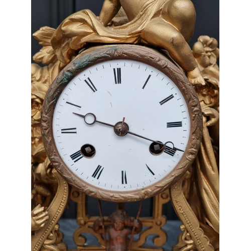 1083 - A gilt painted spelter mantel clock, 38.5cm wide, with pendulum.