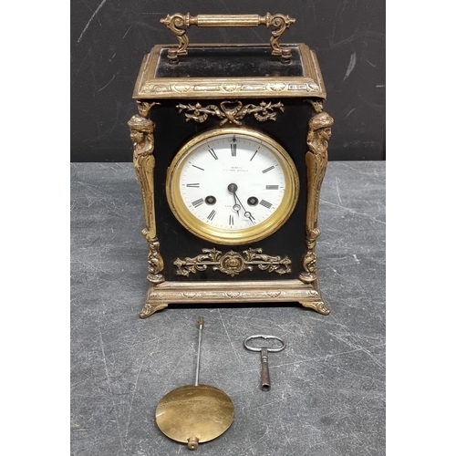 1091 - A late 19th century ebonised and brass mantle clock, the enamel dial inscribed 'Christie, Canno... 