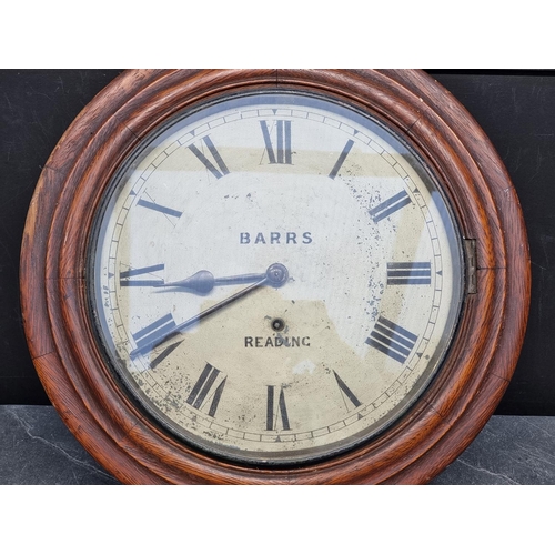 1095 - A Victorian oak wall clock, the 12in painted dial inscribed 'Barrs, Reading', with pendulum.... 