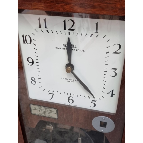 1099 - A National Time Recorder clocking in clock, 98.5cm high.