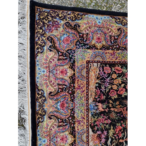 1100 - A fine Persian silk rug, decorated with hunting scene to central field, 167 x 105cm.... 