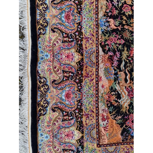 1100 - A fine Persian silk rug, decorated with hunting scene to central field, 167 x 105cm.... 