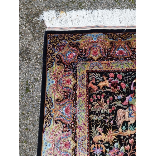 1100 - A fine Persian silk rug, decorated with hunting scene to central field, 167 x 105cm.... 