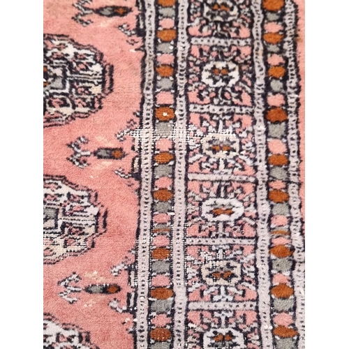 1102 - A group of four Persian rugs, largest, 147 x 95cm.