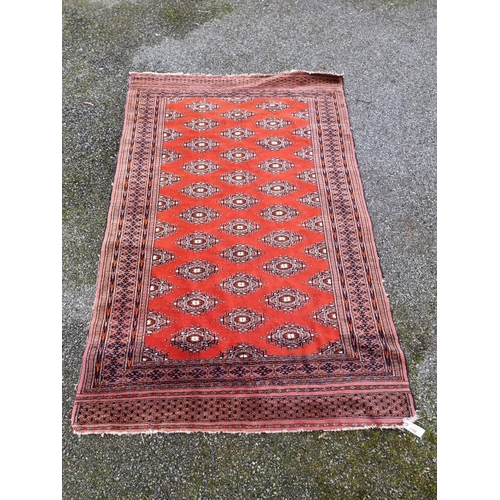 1104 - A Bokhara rug, having repeated design allover, 194 x 128cm.