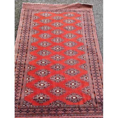 1104 - A Bokhara rug, having repeated design allover, 194 x 128cm.