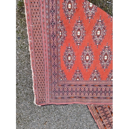 1104 - A Bokhara rug, having repeated design allover, 194 x 128cm.