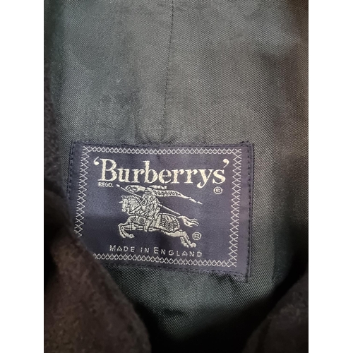 1262 - Burberrys: a mens navy wool belted overcoat, approx 48in chest.