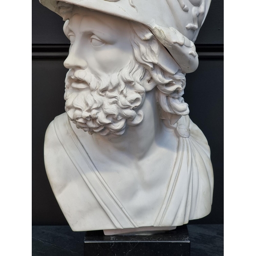 1323 - After the Antique: a life size resin bust of Menelaus, on marble base, 58cm high, (repairs).... 