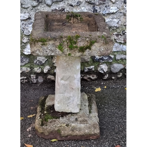 1689 - An old weathered composition stone pedestal bird bath, 74.5cm high.