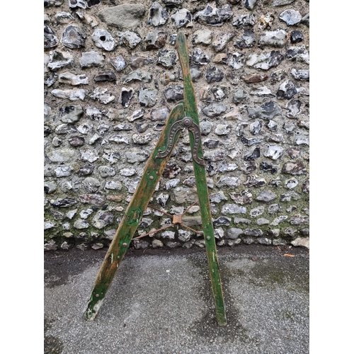 1693 - A vintage green painted ladder, the elaborate hinge inscribed 'Simplex', 134cm high when open.... 