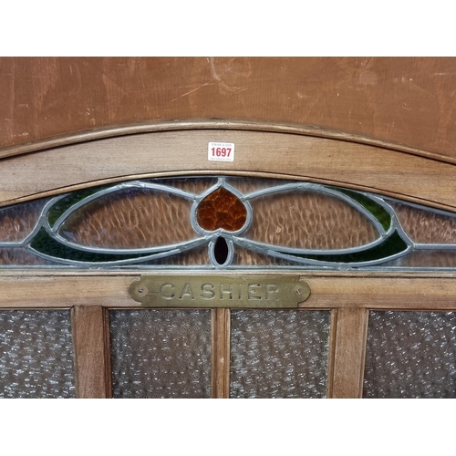 1697 - A walnut and glass 'Cashier' window, 103cm high x 109.5cm wide.