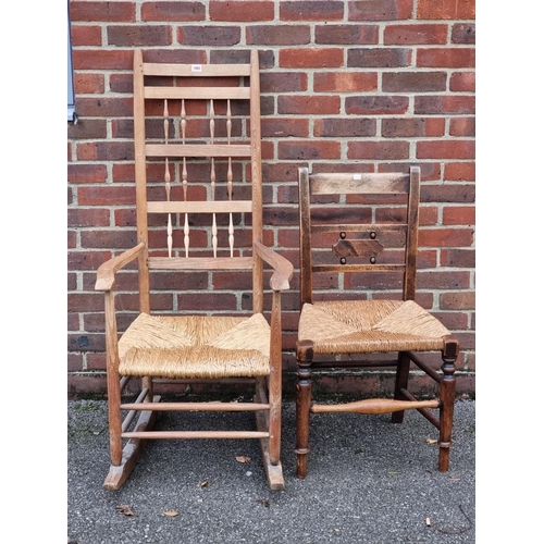 1065 - An antique ash and rush seated spindle back rocking chair; together with another ash and rush s... 